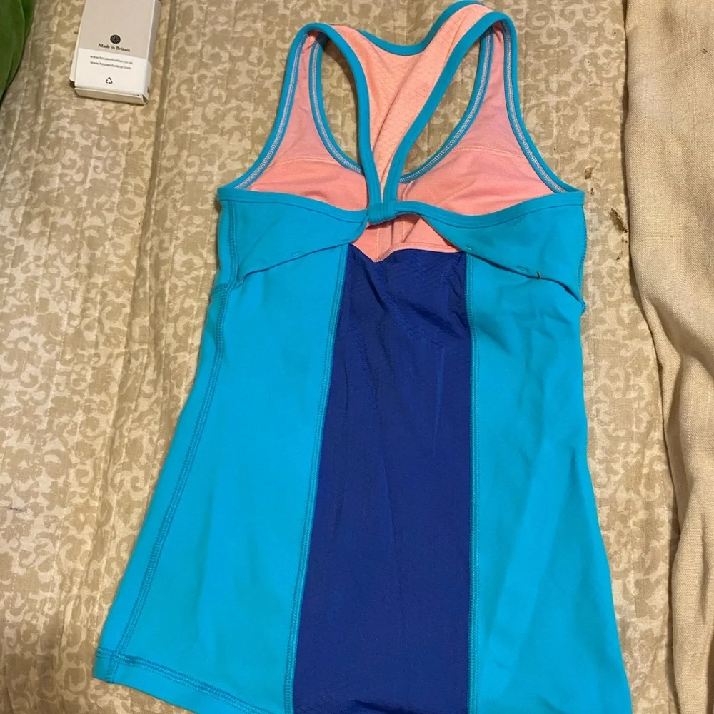 Ivivva light blue tank top in great condition. Has a built in bra. - Picture 2 of 2